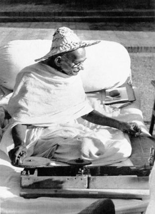Gandhi Spinning in Naokhali. Image source: Wikimedia